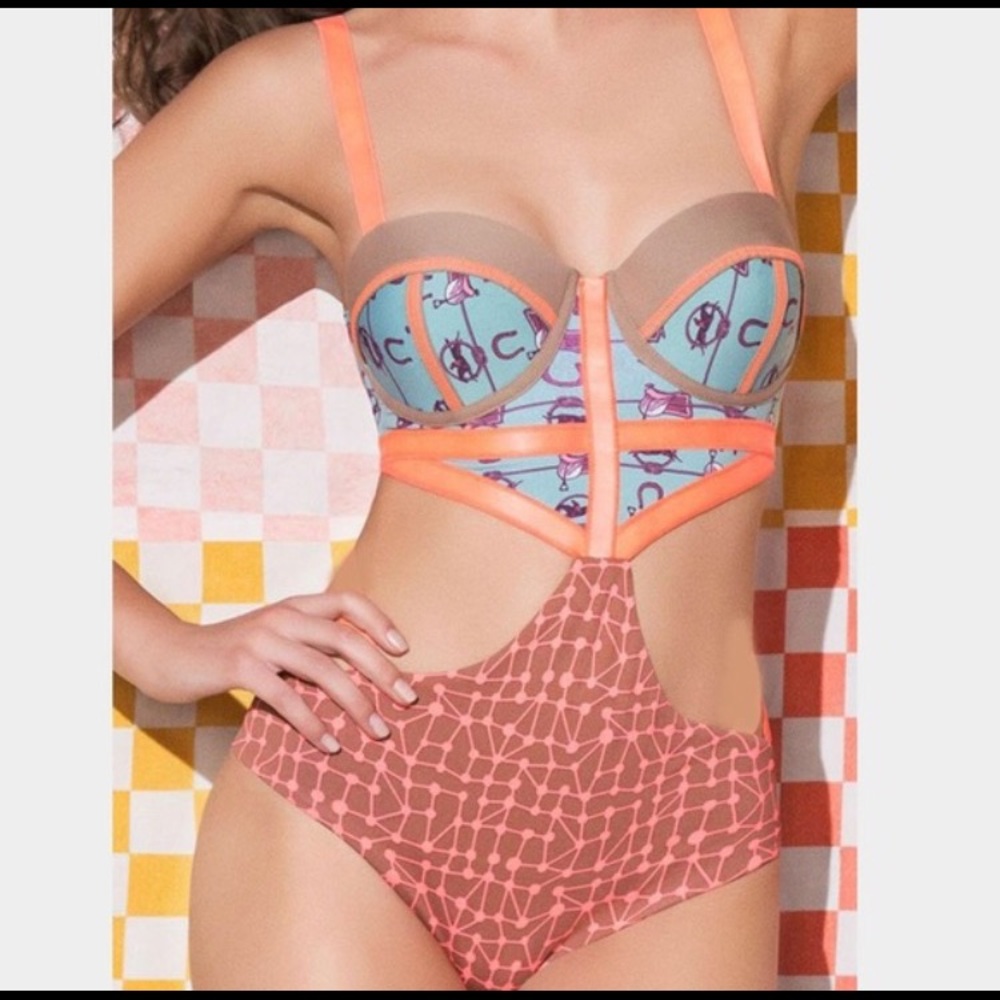 Gently worn cut out maaji bathing suit.